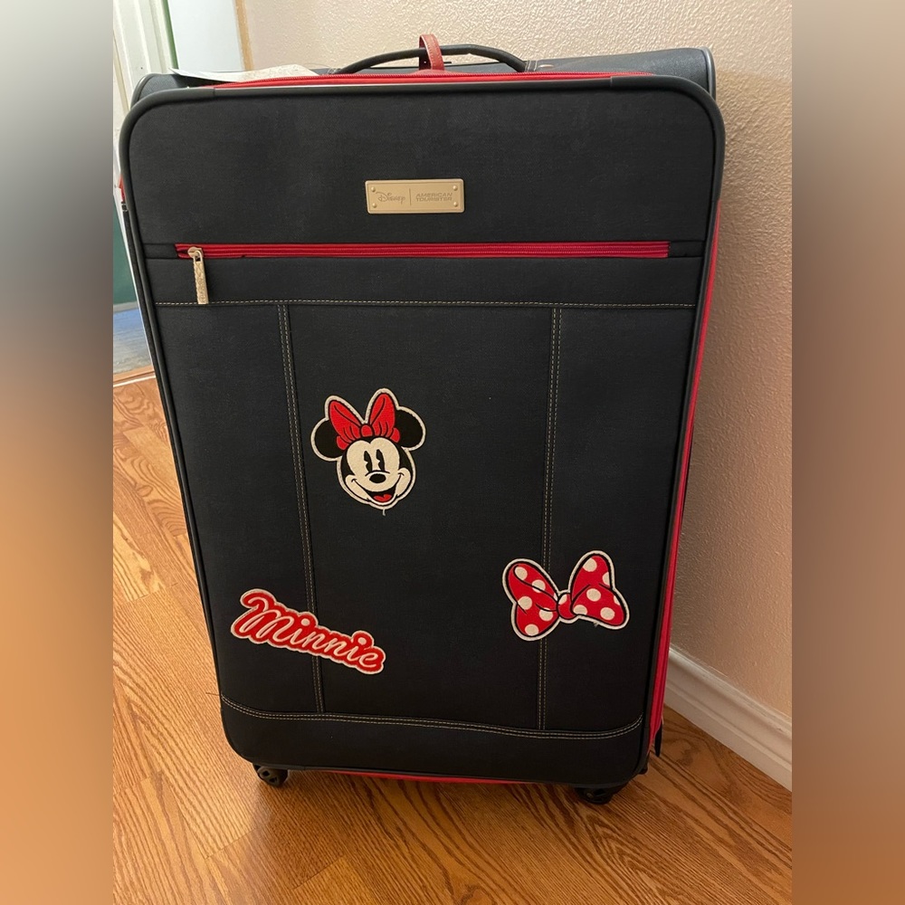 American Tourister Minnie Mouse Luggage with spinner wheels. Brand New.
